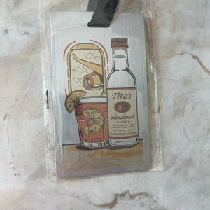 Tito’s handmade vodka metal luggage tag